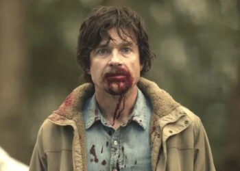 Jason Bateman as Terry Maitland with blood on his face in The Outsider