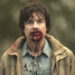 Jason Bateman as Terry Maitland with blood on his face in The Outsider