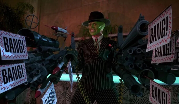 Stanley Ipkiss, possessed by the Mask, holding large cartoony guns in The Mask