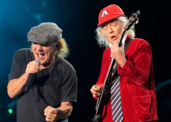 Brian Johnson, left, and Angus Young of AC/DC performs on Friday, April 18, 2025, at Rose Bowl Stadium in Pasadena, Calif.