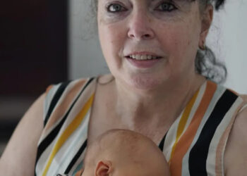 Adam’s mother Caroline with his son George (Instagram)
