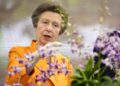 Anne admires flower named after late royal in Singaporean botanic garden