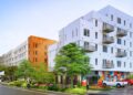 Rendering of The Opaline, an affordable housing initiative targeted at Nashville's musicians. The Opaline will have 251 rental units, offering studios all the way up to three bedrooms, ranged $1,100 to $1700, for families at 60% of area median income. There will also be space on the first floor for artists to practice their craft, a childcare facility and a WeGo Transit center right in front. (Courtesy{ }Holladay Ventures){p}{/p}