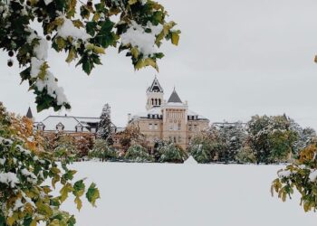 Old Main in winter snow.