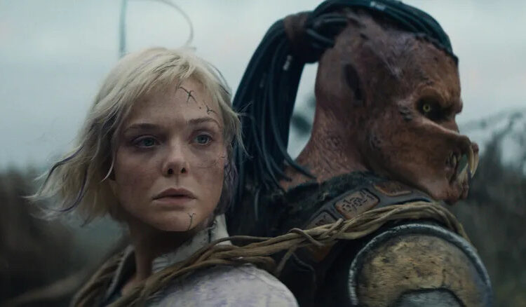 Thia and Dek looking to the side in Predator: Badlands (2025)
