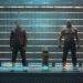 Zoe Saldaña as Gamora, Chris Pratt as Peter Quill, Bradley Cooper as Rocket Raccoon, Dave Bautista as Drax, and Vin Diesel as Groot stand in a lineup in Guardians of the Galaxy