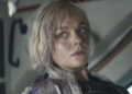 Elle Fanning as Thia in Predator: Badlands.