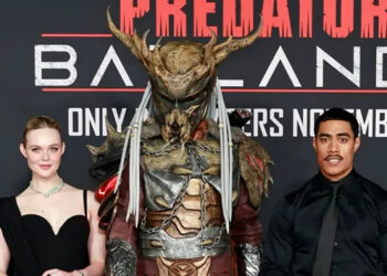 Elle Fanning and Dimitrius Schuster-Koloamatangi attend the World Premiere of 20th Century Studios "Predator: Badlands" at TCL Chinese Theatre on November 03, 2025 in Hollywood, California. (Frazer Harrison/WireImage)
