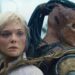 This image released by 20th Century Studios shows Thia, portrayed by Elle Fanning, left, and Dek, portrayed by Dimitrius Schuster-Koloamatangi, in a scene from "Predator: Badlands." (20th Century Studios/Disney via AP)