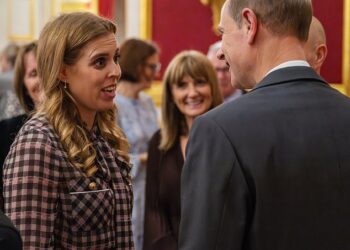 Princess Beatrice pictured accepting her role as deputy patron of The Outward Bound Trust with her uncle Prince Edward at a reception and dinner at St James's Palace on Thursday
