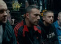 Jem and Doug sit in the back of the van in "The Town" (2010)