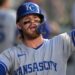 Sep 23, 2025; Anaheim, California, USA;  Kansas City Royals shortstop Bobby Witt Jr. (7) is greeted in the dugout after scoring during the first inning against the Los Angeles Angels at Angel Stadium. Mandatory Credit: Jayne Kamin-Oncea-Imagn Images