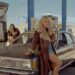 A still of Sabrina Carpenter smoking a cigarette in her ‘Manchild’ music video.