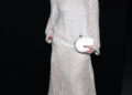 elle fanning wears a sequined top and skirt