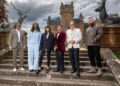 The final contestants of Celebrity Traitors standing with host Claudia Winkleman on the steps outside, posing together after the finale.