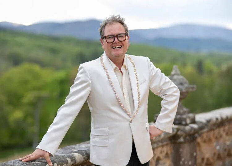 Alan Carr is outside the Scottish castle on Celebrity Traitors