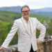 Alan Carr is outside the Scottish castle on Celebrity Traitors