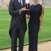 Sir David Beckham with wife Victoria after he was made a Knight Bachelor at an investiture ceremony at Windsor Castle on November 4, 2025 in Windsor, England.