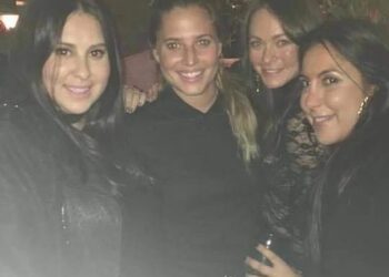 In a world exclusive, the Daily Mail can unmask Melissa Lovallo (pictured far right), a 50-year-old former Ralph Lauren executive, as the woman behind DeuxMoi. Lovallo launched the DeuxMoi as a website in 2013, alongside Meggie Kempner (pictured second from right).
