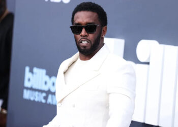 Diddy in white suit