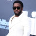 Diddy in white suit