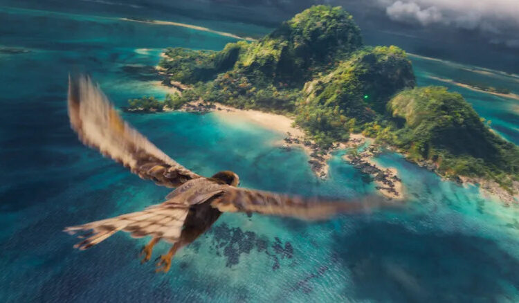 A bird flying over an island in the live-action Moana