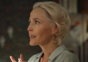 Jean Milburn (Gillian Anderson) clasping her hands on Sex Education