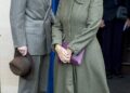 Sophie, Duchess of Edinburgh and Prince Edward, Duke of Edinburgh, pose for photographs after reopening the Royal Box at Newbury Racecourse