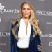 Elizabeth Berkley returns to Showgirls for new fashion campaign