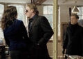 Rupert Everett's Ferguson intimidating Emily Blunt's Rose as Martin Freeman's Hector Dixon watches in Wild Target