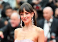 Dakota Johnson at the "Highest 2 Lowest" Premiere during The 78th Cannes Film Festival at Palais des Festivals on May 19, 2025 in Cannes, France.