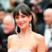 Dakota Johnson at the "Highest 2 Lowest" Premiere during The 78th Cannes Film Festival at Palais des Festivals on May 19, 2025 in Cannes, France.