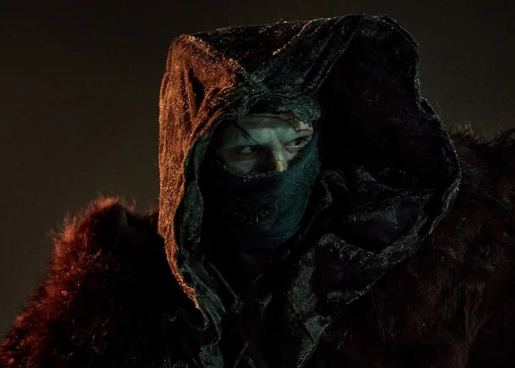 The Creature (Jacob Elordi) looks on in Frankenstein.