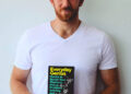 Author and memory champ Nelson Dellis holds a copy of his book, which is due out in 2026. Dellis studied Taylor Swift's entire discography over the summer, committing it to memory.