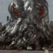 Hedorah eating up some cars outside a factory in Godzilla vs. Hedorah