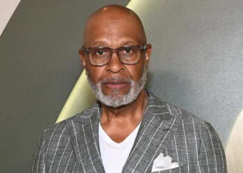 James Pickens Jr. wears grey striped suit