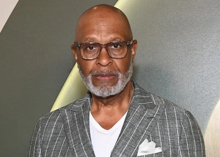 James Pickens Jr. wears grey striped suit