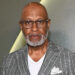 James Pickens Jr. wears grey striped suit