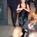 Hailey Bieber wears a vintage Bob Mackie dress and Saint Laurent pumps to attend Kris Jenner's 70th birthday party