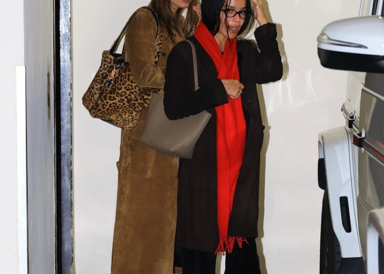 Hailey Bieber and Zo&euml; Kravitz met up at Sushi Park in complementary suede fall coats