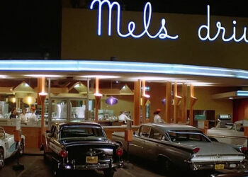 Neon lights illuminated Mel's Drive-in in American Grafitti