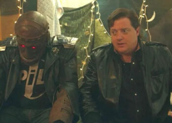 Brendan Fraser as Cliff Steele sitting next to Robot Man in Doom Patrol