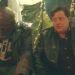 Brendan Fraser as Cliff Steele sitting next to Robot Man in Doom Patrol