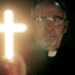 Father Callahan waving a glowing cross in 'Salem's Lot