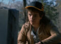 Dustin looking at Eddie's grave in Stranger Things