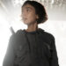 Sydney Chandler as Wendy standing in front of a bright light in Alien: Earth