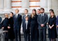 Image may contain: William Byron, Sam Sweeney, Groupshot, Person, People, Adult, Clothing, Formal Wear, Suit, and Coat