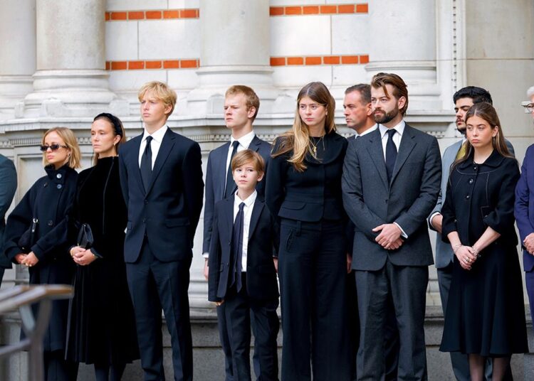 Image may contain: William Byron, Sam Sweeney, Groupshot, Person, People, Adult, Clothing, Formal Wear, Suit, and Coat