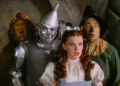 USA. Judy Garland, Ray Bolger, Jack Haley, and Bert Lahr  in a scene from the (C)Metro-Goldwyn-Mayer classic film : The Wizard of Oz (1939).  Plot: Young Dorothy Gale and her dog Toto are swept away by a tornado from their Kansas farm to the magical Land of Oz, and embark on a quest with three new friends to see the Wizard, who can return her to her home and fulfill the others' wishes. Ref: LMK110-J10565-230224 Supplied by LMKMEDIA. Editorial Only. Landmark Media is not the copyright owner of these Film or TV stills but provides a service only for recognised Media outlets. pictures@lmkmedia.co