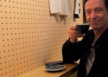 Hugh Jackman enjoying a coffee at the Le Peleton Cafe.